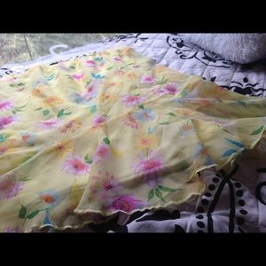 Cute girls yellow skirt with flowers